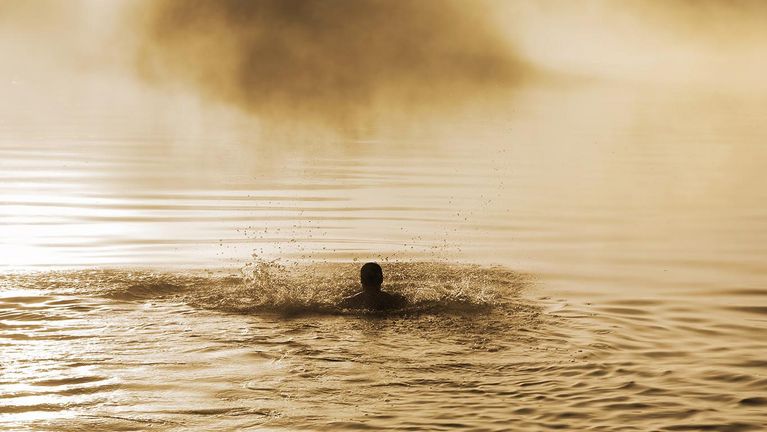 [Translate to es_es:] Schwimmer in einem See